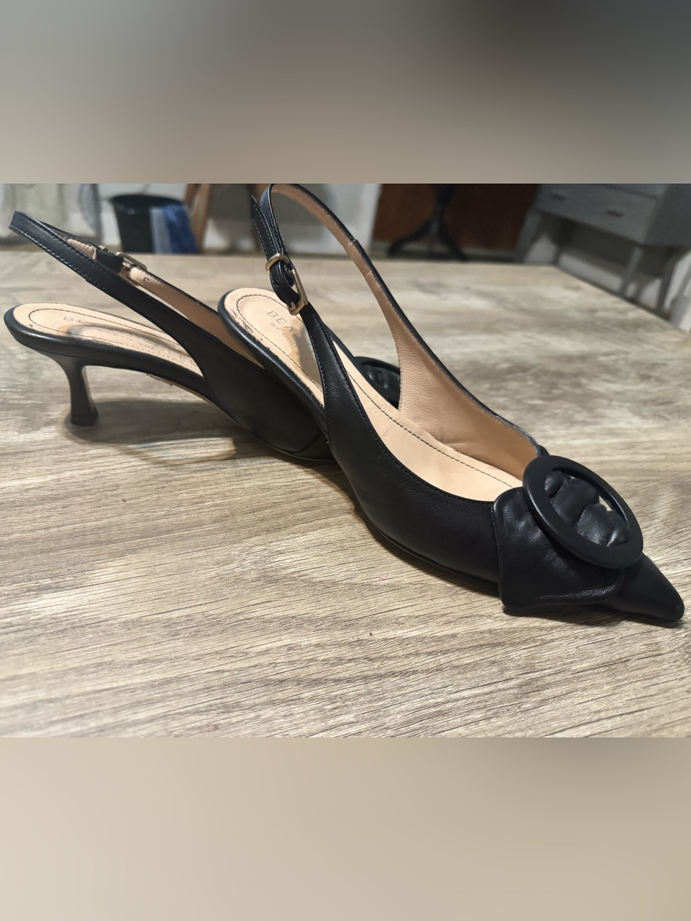 Beautiisoles. Black Leather Slingback Kitten Heel with Decorative Round Accent